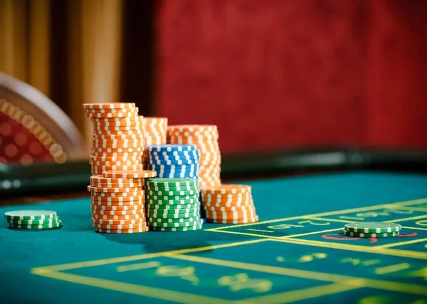 Live dealer studio broadcasting a blackjack game with HD camera feeds